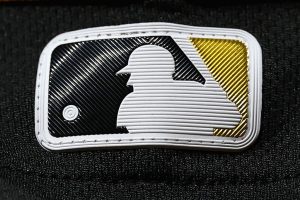 The Major League Baseball logo is seen on a Pittsburgh Pirates uniform during the ninth inning against the Philadelphia Phillies at Citizens Bank Park on September 28, 2023 in Philadelphia, Pennsylvania.