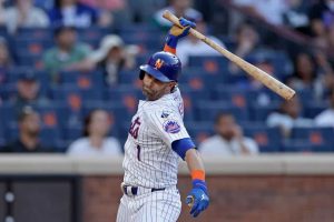 Jeff McNeil #1 of the New York Mets reacts after popping out with the bases loaded during the ninth inning against the Los Angeles Dodgers in game one of a doubleheader at Citi Field on May 28, 2024 in New York City.