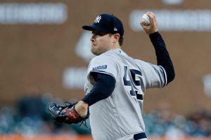 Gerrit Cole #45 of the New York Yankees pitches against the Detroit Tigers during the fourth inning at Comerica Park on August 30, 2023 in Detroit, Michigan.