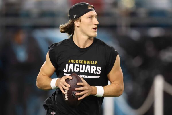 JACKSONVILLE, FLORIDA - DECEMBER 17: Trevor Lawrence #16 of the Jacksonville Jaguars warms up before the game against the Baltimore Ravens at EverBank Stadium on December 17, 2023 in Jacksonville, Florida.