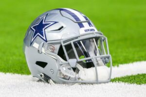 Dallas Cowboys helmet sits on the field during the football game between the Dallas Cowboys and Houston Texans on August 30, 2018 at NRG Stadium in Houston, Texas.