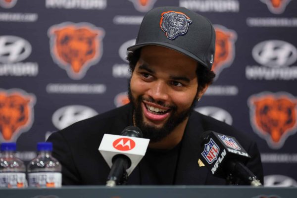 LAKE FOREST, ILLINOIS - APRIL 26: Caleb Williams #18 of the Chicago Bears speaks answers a question from the media during his introductory press conference at Halas Hall on April 26, 2024 in Lake Forest, Illinois. Caleb Williams was drafted first overall in the 2024 NFL Draft on Thursday.
