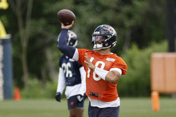 Caleb Williams Expresses Confidence in Chicago Bears Despite High Expectations: ‘We’re Going to Exceed Expectations’ Chicago Bears quarterback Caleb Williams (18) passes the ball during the team's minicamp at Halas Hall.