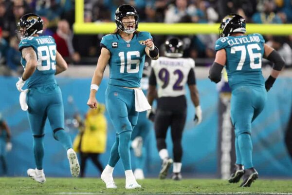 Trevor Lawrence #16 of the Jacksonville Jaguars celebrates after his touchdown pass against the Baltimore Ravens during the third quarter at EverBank Stadium on December 17, 2023 in Jacksonville, Florida.