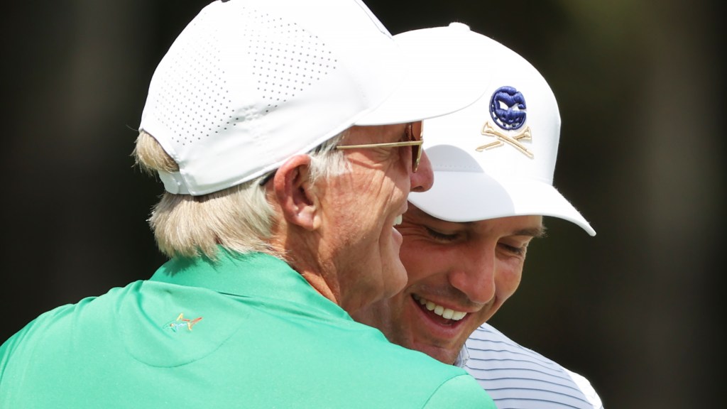 Greg Norman, Bryson DeChambeau lift U.S. Open trophy