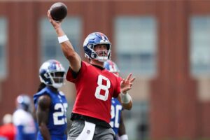 Daniel Jones #8 of the New York Giants throws the ball during New York Giants OTA Offseason Workouts at NY Giants Quest Diagnostics Training Center on June 06, 2024 in East Rutherford, New Jersey.