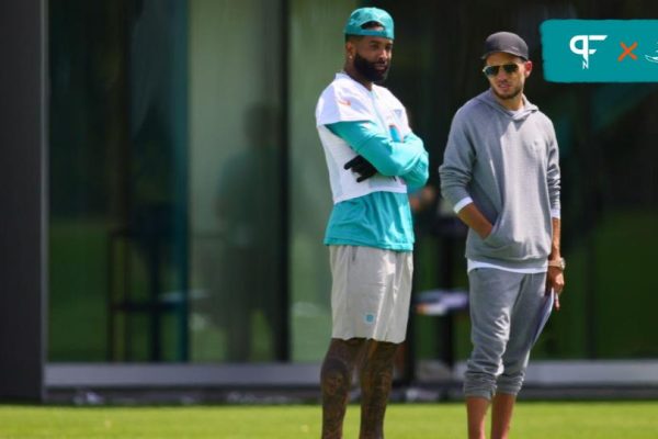 Miami Dolphins wide receiver Odell Beckham Jr. (3) and head coach Mike McDaniel look on during mandatory minicamp at Baptist Health Training Complex.