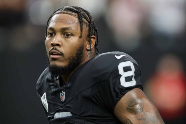 LAS VEGAS, NEVADA - DECEMBER 10: Josh Jacobs #8 of the Las Vegas Raiders reacts before the game against the Minnesota Vikings at Allegiant Stadium on December 10, 2023 in Las Vegas, Nevada.