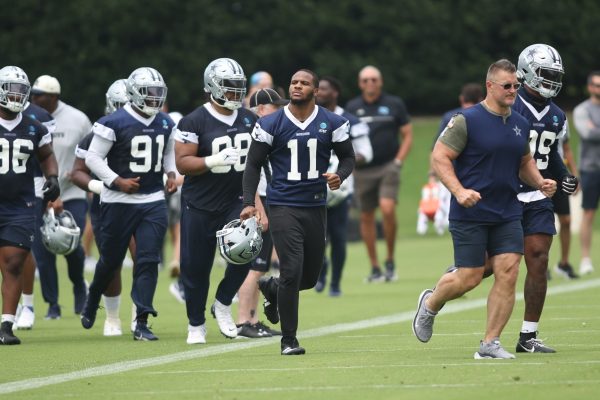 Dallas Cowboys linebacker Micah Parsons (11) runs on the field during practice at the Ford Center at the Star Training Facility in Frisco, Texas. Mandatory Credit: Tim Heitman-USA TODAY Sports