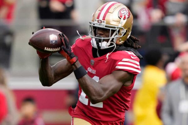 Brandon Aiyuk #11 of the San Francisco 49ers catches a pass during warm-ups prior to the game against the Arizona Cardinals at Levi