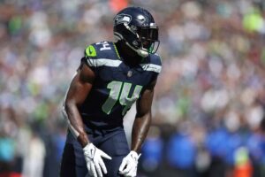 DK Metcalf #14 of the Seattle Seahawks prepares for a snap against the Los Angeles Rams at Lumen Field on September 10, 2023 in Seattle, Washington.