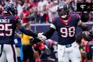 Houston Texans defensive tackle Sheldon Rankins (98) celebrates his touchdown off a ball fumbled by Tennessee Titans quarterback Will Levis during the second quarter at NRG Stadium in Houston, Texas., Sunday, Dec. 31, 2023.