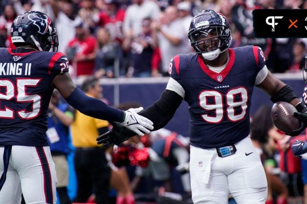 Houston Texans defensive tackle Sheldon Rankins (98) celebrates his touchdown off a ball fumbled by Tennessee Titans quarterback Will Levis during the second quarter at NRG Stadium in Houston, Texas., Sunday, Dec. 31, 2023.
