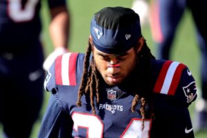 Stephon Gilmore #24 of the New England Patriots warms up prior to facing the Arizona Cardinals at Gillette Stadium on November 29, 2020 in Foxborough, Massachusetts.