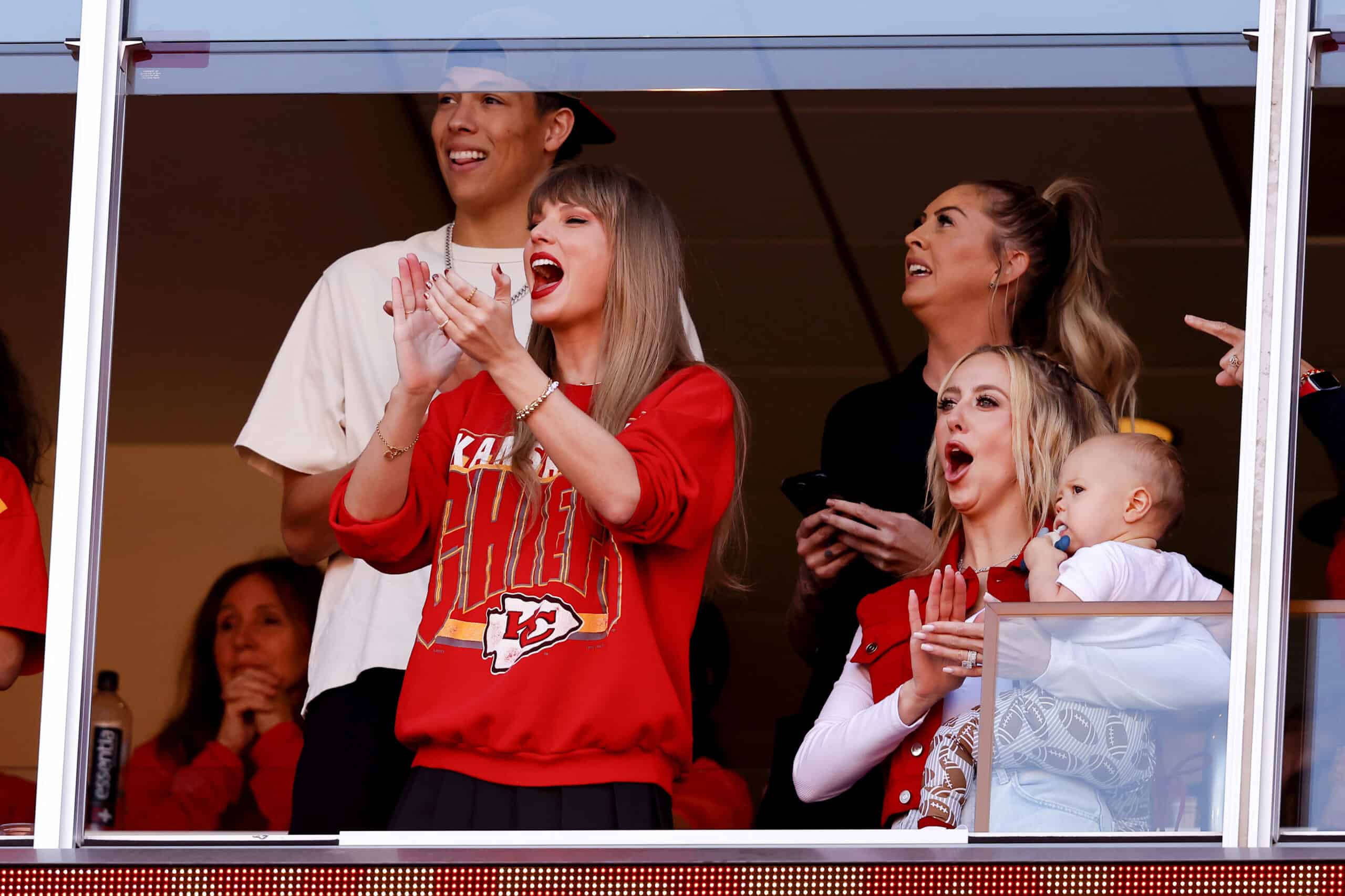 KANSAS CITY, MISSOURI - OCTOBER 22: Taylor Swift and Brittany Mahomes react during a game between the Los Angeles Chargers and Kansas City Chiefs at GEHA Field at Arrowhead Stadium on October 22, 2023 in Kansas City, Missouri.