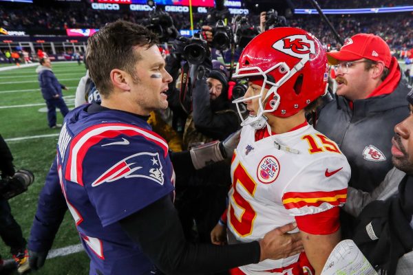 New England Patriots quarterback Tom Brady (12) and Kansas City Chiefs quarterback Patrick Mahomes (15) after the game at Gillette Stadium. Mandatory Credit: Paul Rutherford-USA TODAY Sports