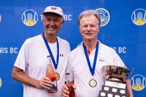 65+ finalists at the Masters event in Vancouver Robert Bettauer (right) and David Fairbotham hold their trophies.