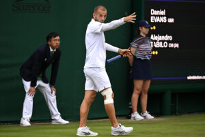 Wimbledon | Evans loses out in slippery conditions