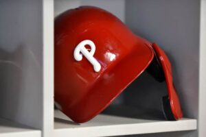 A detailed view of the batting helmet of Roman Quinn #24 of the Philadelphia Phillies in the dugout before the start of the game against the Miami Marlins at Marlins Park on June 28, 2019 in Miami, Florida.