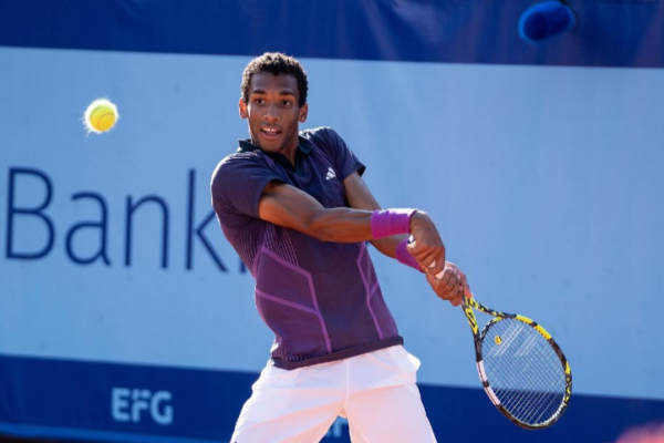 Felix Auger-Aliassime prepares to hit a backhand in Gstaad. He lost to Matteo Berrettini.