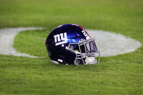 A New York Giants helmet sits on the field prior to the start of the game against the Washington Commanders at FedExField on December 18, 2022 in Landover, Maryland.