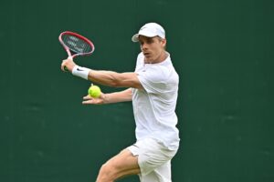Denis Shapovalov slices a backhand. He lost to Ben Shelton on Saturday at Wimbledon.