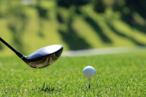 WATCH: Bride wins a closest to the pin competition in her wedding dress