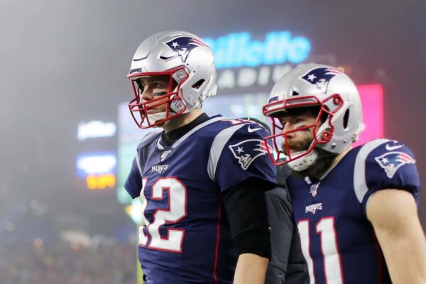 Julian Edelman Discusses What Can Make Him Upset with Tom Brady Tom Brady #12 of the New England Patriots and Julian Edelman #11 look on after Edelman scored a touchdown in the second quarter of the AFC Wild Card Playoff game at Gillette Stadium on January 04, 2020 in Foxborough, Massachusetts.