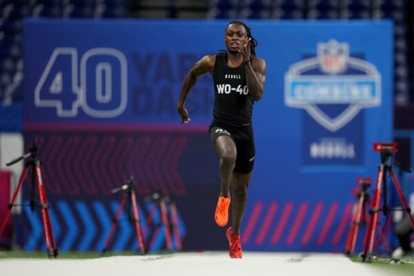 Texas Longhorns WR Xavier Worthy runs the 40-yard dash at the NFL Scouting Combine.
