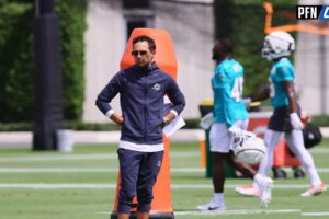 Miami Dolphins head coach Mike McDaniel watches from the field during training camp at Baptist Health Training Complex.