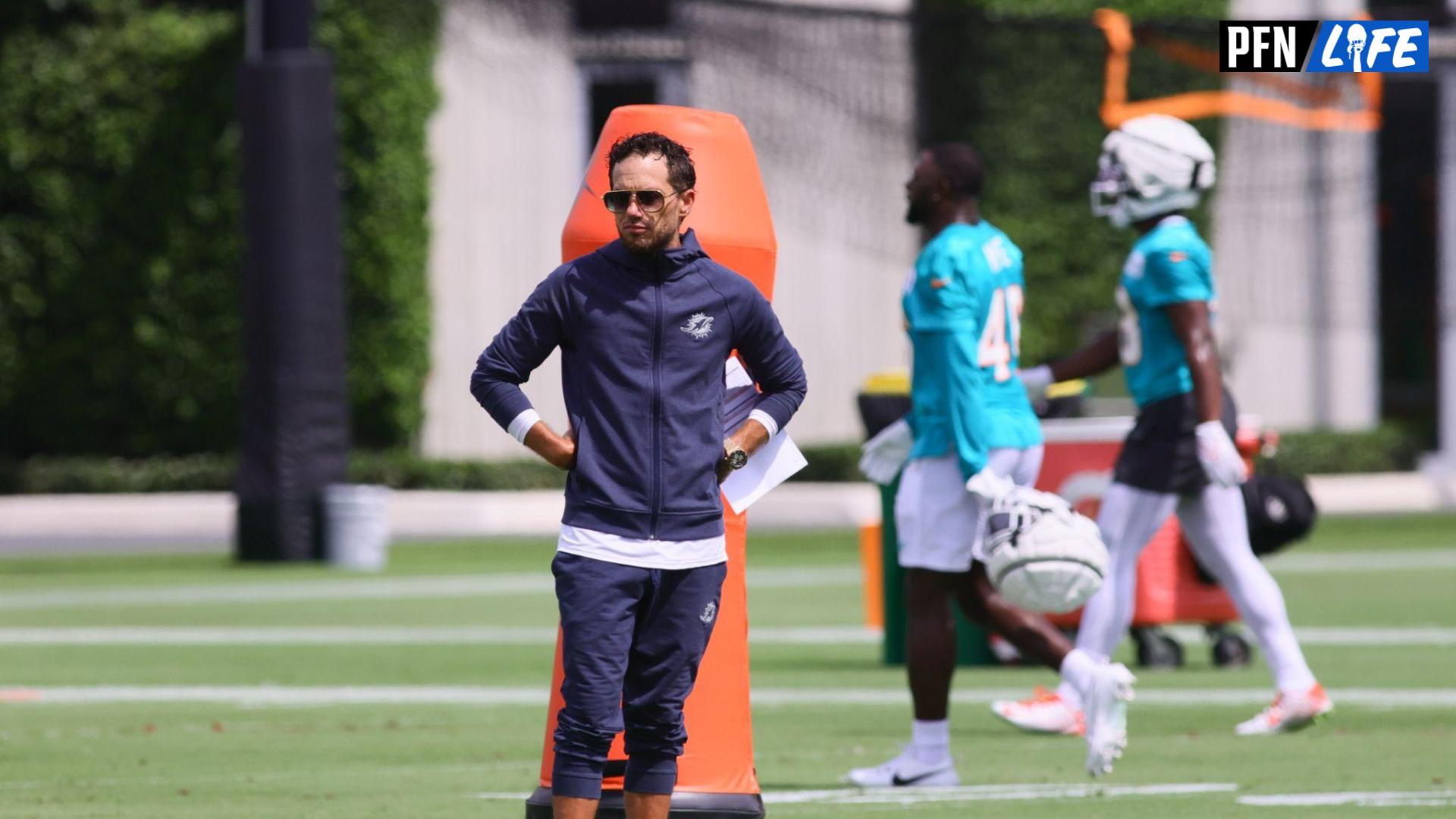 Miami Dolphins head coach Mike McDaniel watches from the field during training camp at Baptist Health Training Complex.