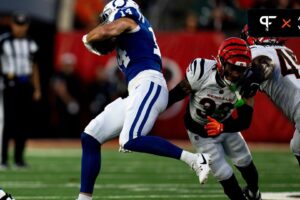 Cincinnati Bengals safety Daijahn Anthony (33) attempts to tackle Indianapolis Colts wide receiver Alec Pierce (14) in the first quarter between the Cincinnati Bengals and the Indianapolis Colts at Paycor Stadium in Cincinnati on Thursday, Aug. 22, 2024.