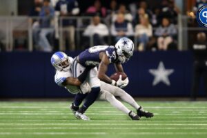 Dallas Cowboys wide receiver CeeDee Lamb (88) catches a pass against Detroit Lions cornerback Cameron Sutton (1) in the second half at AT&T Stadium.