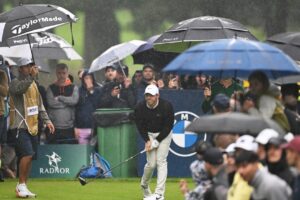 Players, fans battle heavy rain at 2024 BMW PGA Championship