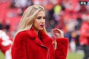 Gracie Hunt on field prior to a game between the Kansas City Chiefs and Las Vegas Raiders at GEHA Field at Arrowhead Stadium.