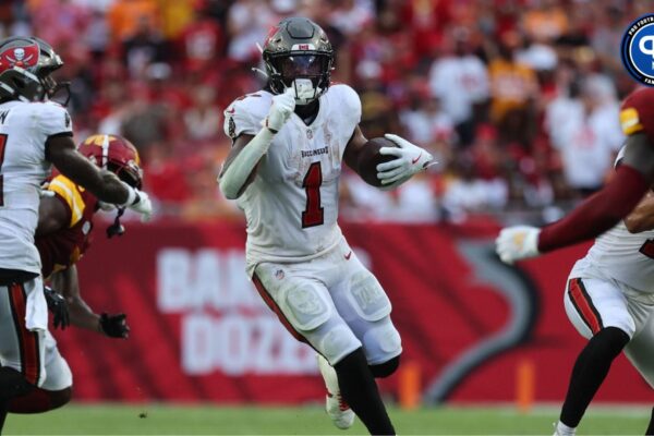 Sep 8, 2024; Tampa, Florida, USA; Tampa Bay Buccaneers running back Rachaad White (1) runs with the ball against the Washington Commanders during the second half at Raymond James Stadium. Mandatory Credit: Kim Klement Neitzel-Imagn Images