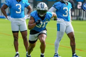 Jul 24, 2024; Charlotte, NC, USA; Carolina Panthers running back Chuba Hubbard (30) runs a pass route at Carolina Panthers Practice Fields. Mandatory Credit: Jim Dedmon-USA TODAY Sports