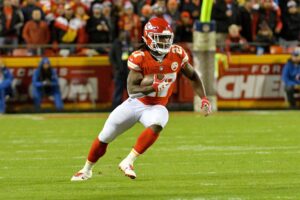Oct 30, 2017; Kansas City, MO, USA; Kansas City Chiefs running back Kareem Hunt (27) runs the ball during the first half against the Denver Broncos at Arrowhead Stadium. Mandatory Credit: Denny Medley-USA TODAY Sports