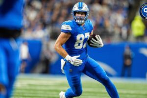 Detroit Lions tight end Sam LaPorta (87) runs for a first down against Los Angeles Rams during the first half at Ford Field in Detroit on Sunday, September 8, 2024.