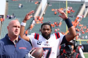 New England Patriots quarterback Jacoby Brissett celebrates following the win over the Cincinnati Bengals at Paycor Stadium. Mandatory Credit: Joseph Maiorana-Imagn Images