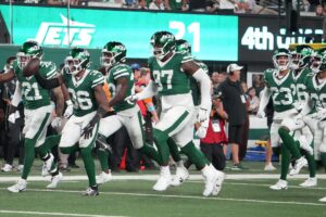 New York Jets safety Chuck Clark (36) after recovering a New England Patriots fumble in the second half at MetLife Stadium. Mandatory Credit: Robert Deutsch-Imagn Images