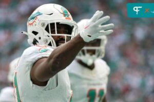 Miami Dolphins running back Raheem Mostert (31) blows a kiss to fans after scoring a touchdown against the New York Jets.