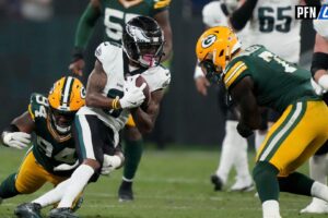Philadelphia Eagles wide receiver DeVonta Smith (6) runs against Green Bay Packers defensive end Karl Brooks (94) and linebacker Quay Walker (7) during the first quarter at Neo Quimica Arena. Mandatory Credit: Kirby Lee-Imagn Images
