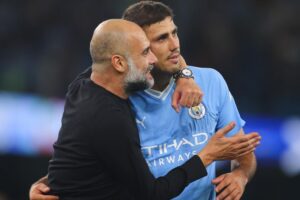 Manchester City Pep Guardiola and Rodri