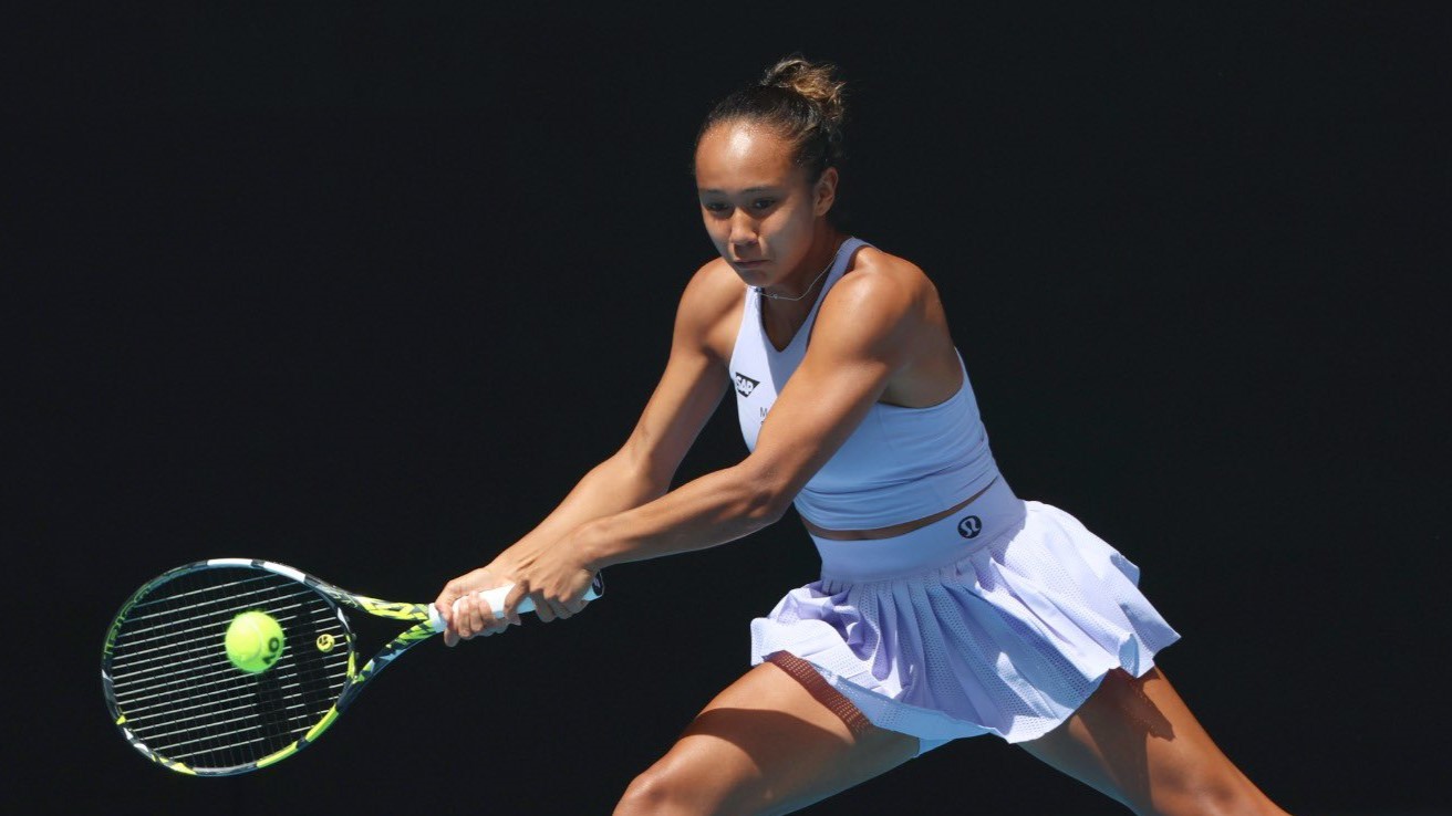 Leylah Fernandez reaches to hit a backhand during her opening Australian Open match.