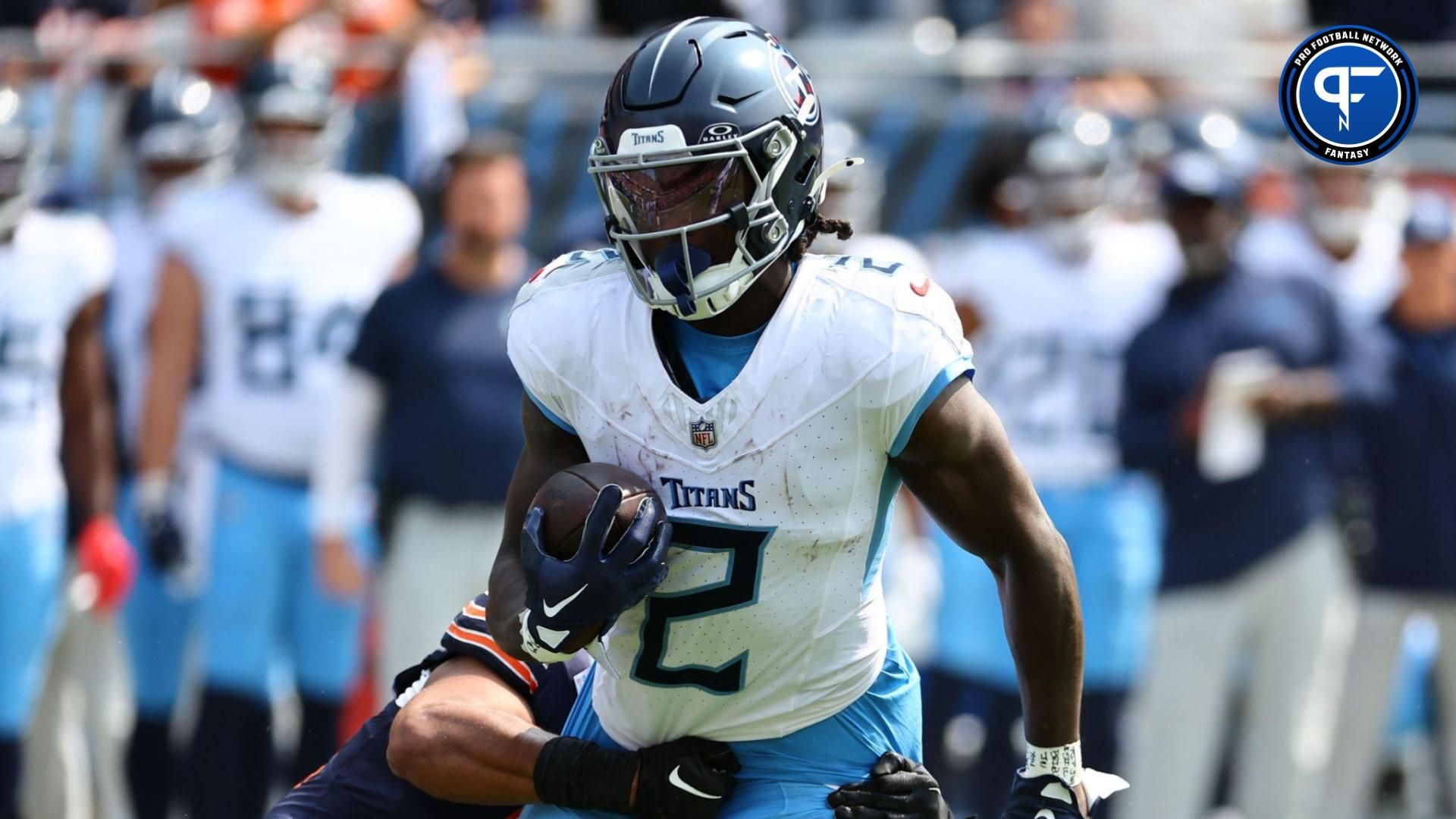 Tennessee Titans running back Tyjae Spears (2) makes a catch against the Chicago Bears during the first quarter at Soldier Field. Mandatory Credit: Mike Dinovo-Imagn Images