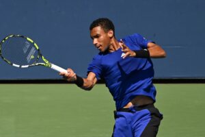 Felix Auger-Aliassime follows through on a forehand. He is competing at the Asian 1000 event in Shanghai this week.