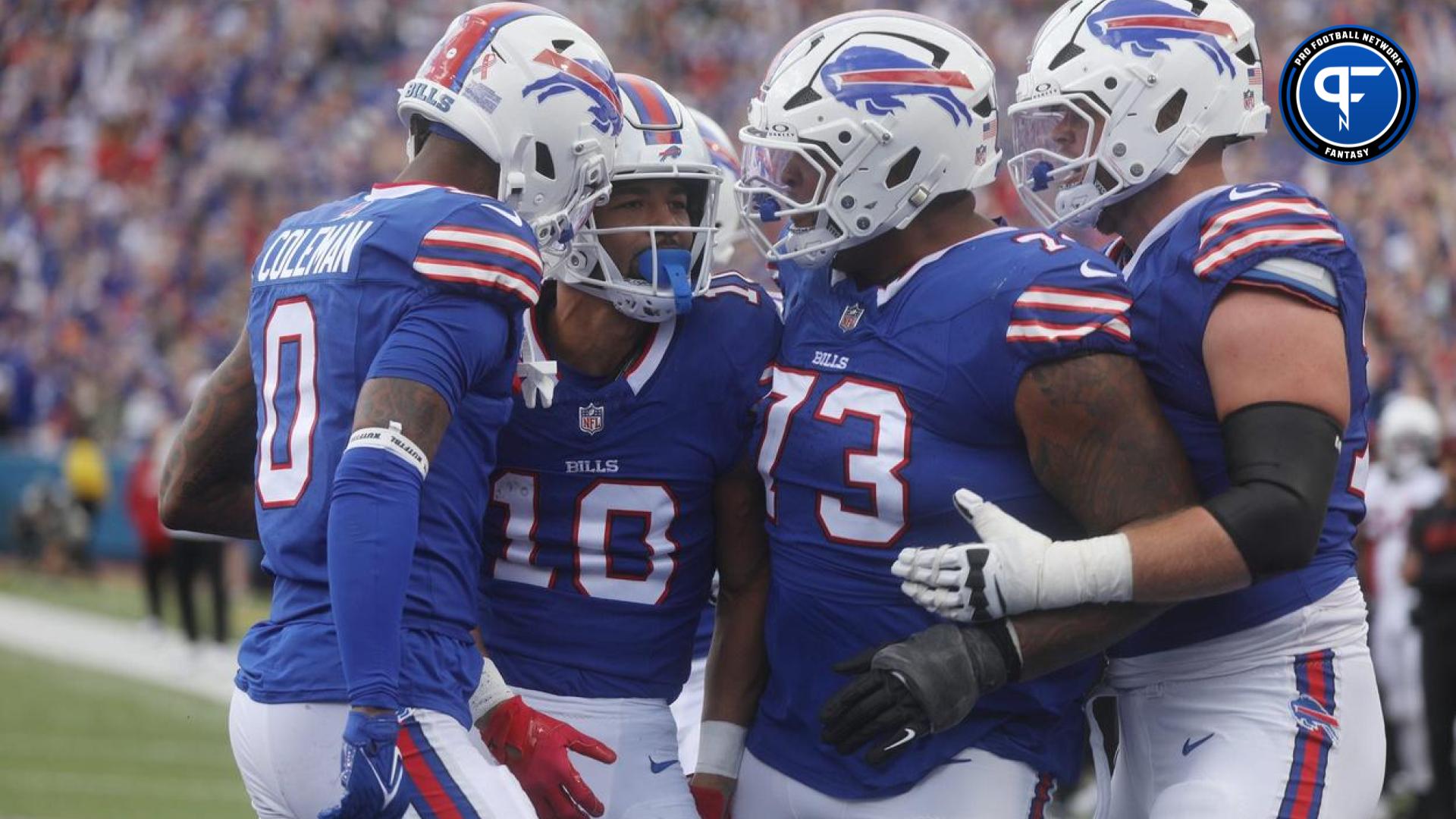 Bills Khalil Shakir is congratulated by teammates Keon Coleman, Dion Dawkins and Spencer Brown on his touchdown catch during the third quarter at Highmark Stadium in Orchard Park on Sept. 8, 2024. Should you start either receiver in fantasy this week?