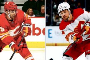 Matt Coronato and Rasmus Andersson of the Calgary Flames