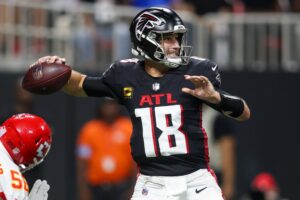 Sep 22, 2024; Atlanta, Georgia, USA; Atlanta Falcons quarterback Kirk Cousins (18) throws a pass against the Kansas City Chiefs in the fourth quarter at Mercedes-Benz Stadium. Mandatory Credit: Brett Davis-Imagn Images